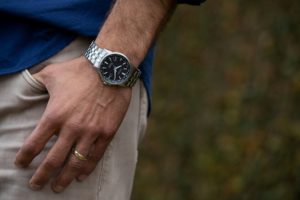 Man's wrist with citizen corso watch